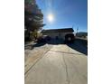 Single story home with a large driveway at 217 Jackson Ave, Las Vegas, NV 89106