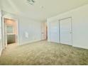 Primary bedroom with carpet flooring and a spacious closet at 340 Banished Ave # 2, North Las Vegas, NV 89031