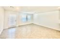 Bright and airy living room with tile floors and neutral walls at 340 Banished Ave # 2, North Las Vegas, NV 89031