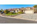 House exterior showcasing a well-maintained front yard at 5728 Palma Del Sol Way, Las Vegas, NV 89130