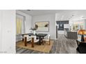 Open concept floor plan with dining room overlooking the kitchen at 10300 Bent Brook Pl, Las Vegas, NV 89134
