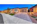 Modern home with driveway and landscaping at 116 Stone Mesa Ct, Henderson, NV 89011