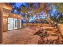 Patio with access to backyard, featuring a water feature at 3390 Brookfield Dr, Las Vegas, NV 89120