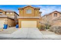 Two-story house with attached garage and desert landscaping at 9204 Weeping Hollow Ave, Las Vegas, NV 89178