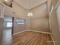 Dining room with hardwood floors and high ceilings at 10279 Montes Vascos Dr, Las Vegas, NV 89178