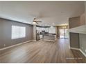 Open kitchen with island and stainless steel appliances at 10279 Montes Vascos Dr, Las Vegas, NV 89178