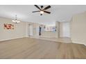 Spacious living area with light wood floors at 2250 Bensley St, Henderson, NV 89044