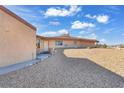 Front view of single-story home with gravel landscaping at 3281 Mark Rd, Pahrump, NV 89060