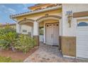 Elegant entryway with double doors and a brick walkway at 394 Gatlinburg Ct, Henderson, NV 89012