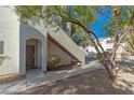 Building entry with stairs and landscaping at 5650 E Sahara Ave # 1012, Las Vegas, NV 89142