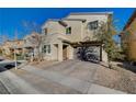 Two-story house with a two-car garage and front yard at 5694 Colbert St, North Las Vegas, NV 89081