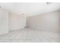 Spacious living room featuring tile floors at 774 Peregrine Falcon St, Henderson, NV 89015