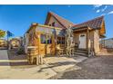 Charming house with a rustic-style exterior and unique yard decor at 919 Havre Ave, Henderson, NV 89015