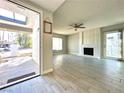 Bright living room featuring a fireplace and tiled flooring, perfect for entertaining and relaxation at 2600 Congress Ave, Las Vegas, NV 89121