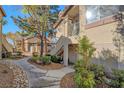 Exterior showing building entrance and walkway at 5710 E Tropicana Ave # 2017, Las Vegas, NV 89122