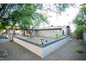 Single story home with a large backyard and block wall at 749 Rossmore Dr, Las Vegas, NV 89110