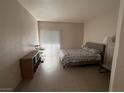 Spacious bedroom with tile flooring and sliding glass door at 9000 Las Vegas Blvd # 1013, Las Vegas, NV 89123