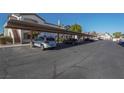 Covered parking area with several cars parked under the structure at 5655 E Sahara Ave # 2024, Las Vegas, NV 89142