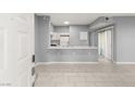 Bright and airy entryway with view into kitchen and living areas at 2251 Wigwam Pkwy # 211, Henderson, NV 89074