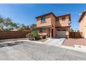 Charming two-story home with stucco exterior, red tile roof, and an attached one car garage at 3396 Villa Fiori Ave, Las Vegas, NV 89141