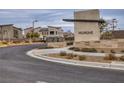 Community entrance with signage and landscaping at 600 N Carriage Hill Dr # 1108, Las Vegas, NV 89138