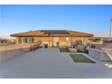 Spacious rooftop deck with furniture, grill, and sunny views. Includes solar panels for energy efficiency at 12745 Fairfield Ave, Henderson, NV 89044