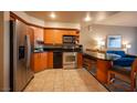 Modern condo kitchen, wood cabinets, granite counters at 211 E Flamingo Rd # 414, Las Vegas, NV 89169