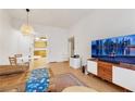 Living room, kitchen view, and dining area at 3125 N Buffalo Dr # 2136, Las Vegas, NV 89128
