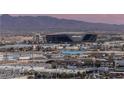 Aerial view of Allegiant Stadium and surrounding area, showcasing the landscape at 4381 W Flamingo Rd # 2105, Las Vegas, NV 89103