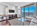 Spacious living area with floor-to-ceiling windows and city views at 4381 W Flamingo Rd # 3819, Las Vegas, NV 89103