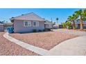 Gray house with a spacious front yard and walkway at 821 Mar Jay Ct, Las Vegas, NV 89107