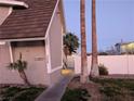 Side entrance to building with stairs and landscaping at 208 Orland St # 9, Las Vegas, NV 89107