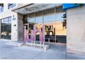 Modern building entrance with prominent signage at 353 E Bonneville Ave # 711, Las Vegas, NV 89101