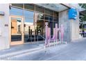 Modern building entrance with prominent signage at 353 E Bonneville Ave # 711, Las Vegas, NV 89101