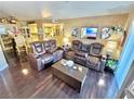 Spacious living room featuring comfortable leather seating and hardwood floors at 3550 Bay Sands Dr # 1070, Laughlin, NV 89029
