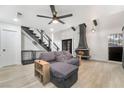 Living room showcasing a cozy sectional sofa and a fireplace at 4071 Village Sq, Las Vegas, NV 89121
