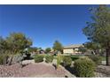 Community center with green lawn and desert landscaping at 6119 Forest Pony Ave, Las Vegas, NV 89122