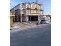 New two-story home under construction featuring scaffolding around the exterior structure at 6592 Tumoulin St, Las Vegas, NV 89148