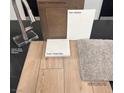 Selection of interior finishings and fixtures including cabinets, carpet, quartz countertop, faucet, and paint at 6592 Tumoulin St, Las Vegas, NV 89148