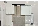 Selection of home interior finishes including quartz countertops and flooring at 334 Taylor St, Henderson, NV 89015
