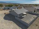Single story home with covered patio and fenced backyard at 5130 Valero Ct, Pahrump, NV 89060