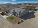 New construction home aerial view, single story, gray roof at 5130 Valero Ct, Pahrump, NV 89060