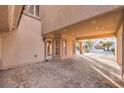 Covered brick driveway leading to house entrance at 7642 Riva Ridge St, Las Vegas, NV 89149