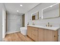 Spa-like bathroom with soaking tub, walk-in shower, and dual vanities at 8645 Edmond St, Las Vegas, NV 89139