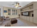 Spacious living room with a built-in entertainment center at 9161 Horizon Mist Ave, Las Vegas, NV 89178