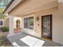 Front door entrance with sidelights and decorative glass at 11017 Ladyburn Ct, Las Vegas, NV 89141