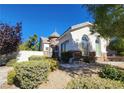 Charming house with unique turret and well-manicured landscaping at 1260 Corista Dr, Henderson, NV 89052