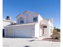 Two-story house with a two-car garage and front yard at 1429 Daybreak Dr, Las Vegas, NV 89108