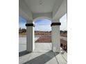 Covered porch with view of desert landscape at 2560 Tahachapi Ave, Pahrump, NV 89048