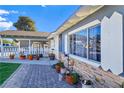 House exterior with stone accents, landscaping, and walkway at 3169 Nottingham Dr, Las Vegas, NV 89121